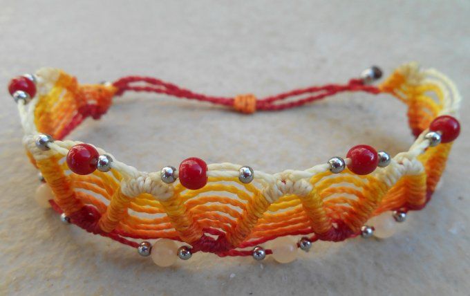Bracelet tissage rouge/orange avec corail rouge, jade jaune et acier inoxydable (réf. BR 1824135)