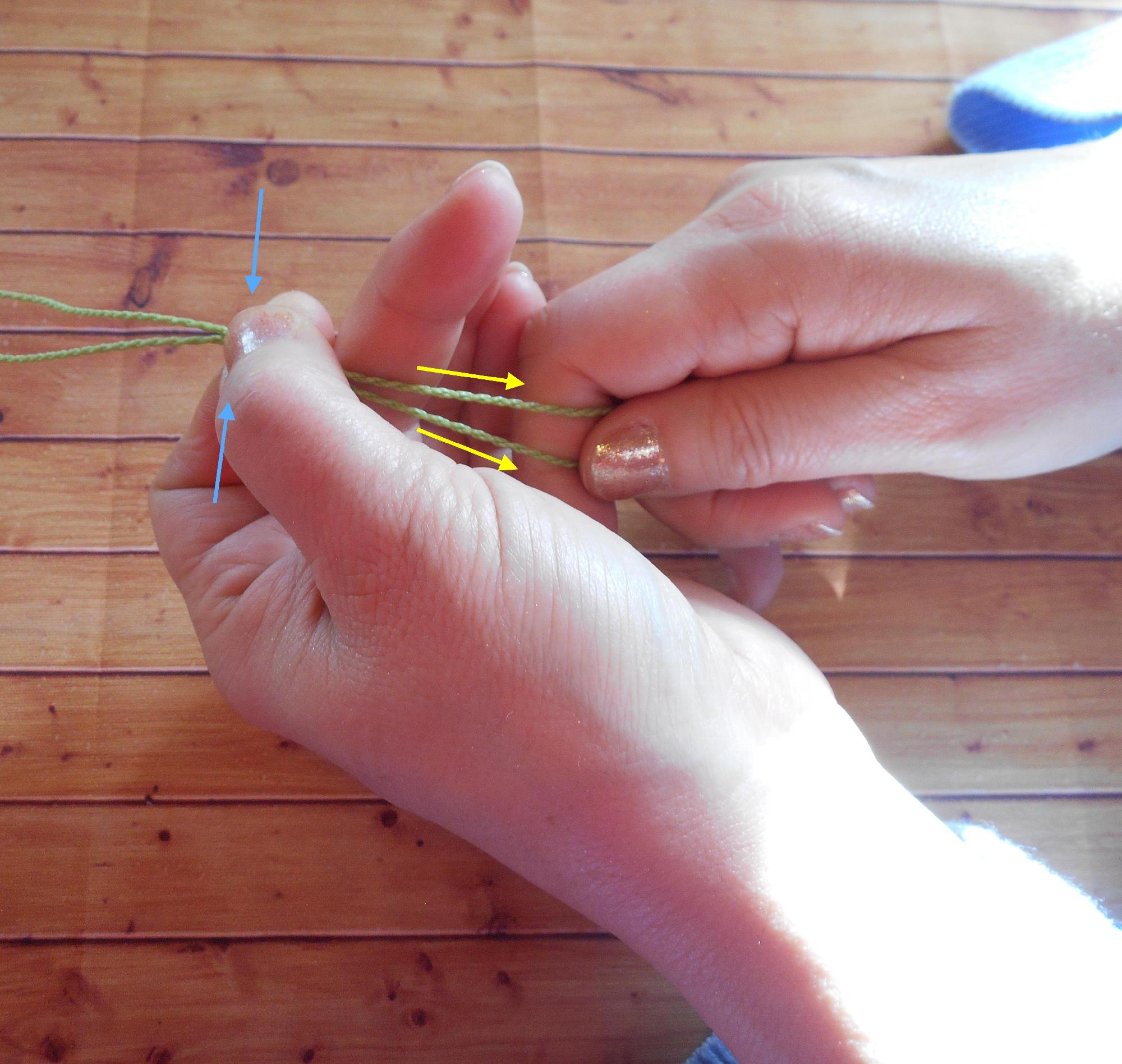  ↑    coulisser le noeud d'un collier, étape 3